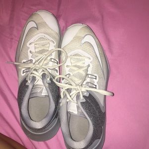 Grey and white nike basketball shoes